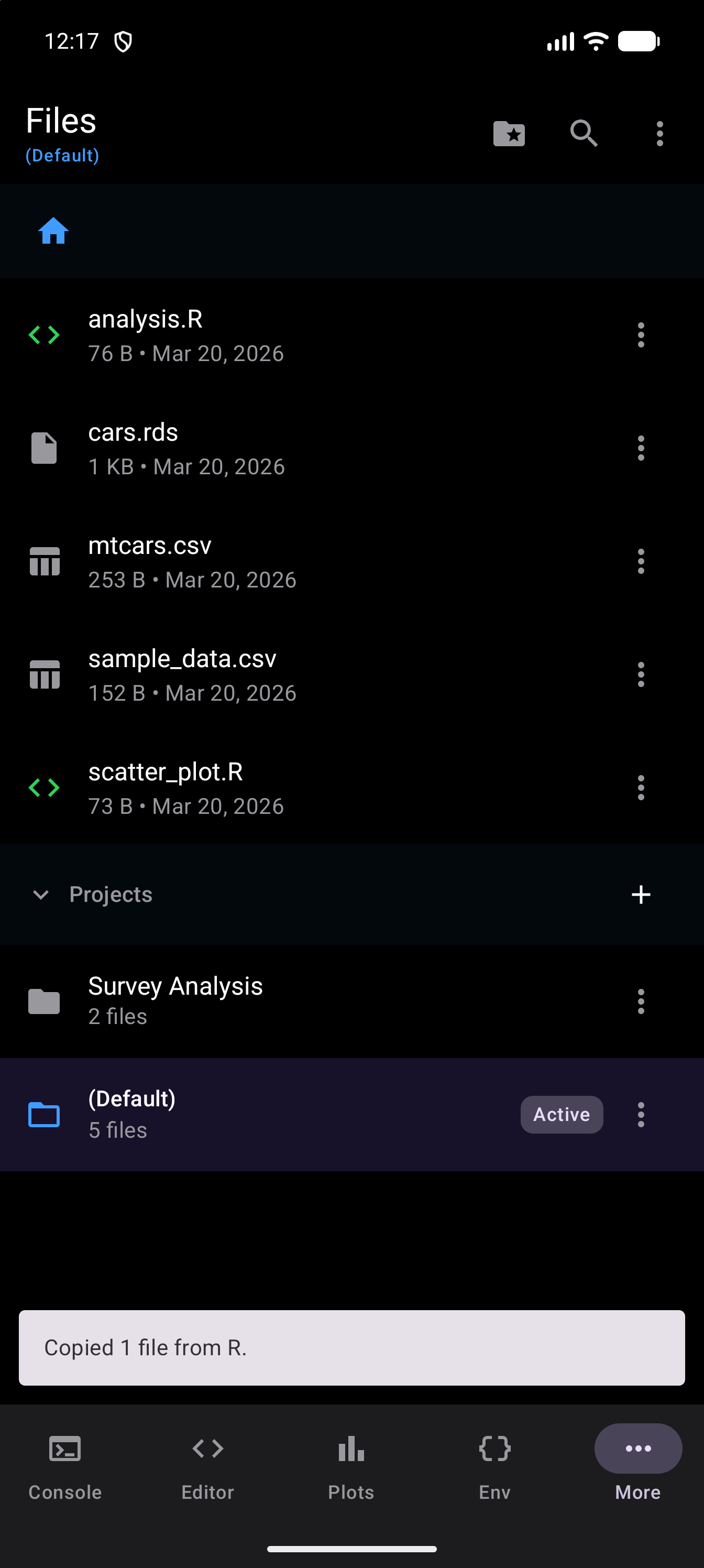 The Files list after Copy Files Back from R, with the new cars.rds among the files and the message “Copied 1 file from R.” at the bottom, in dark mode