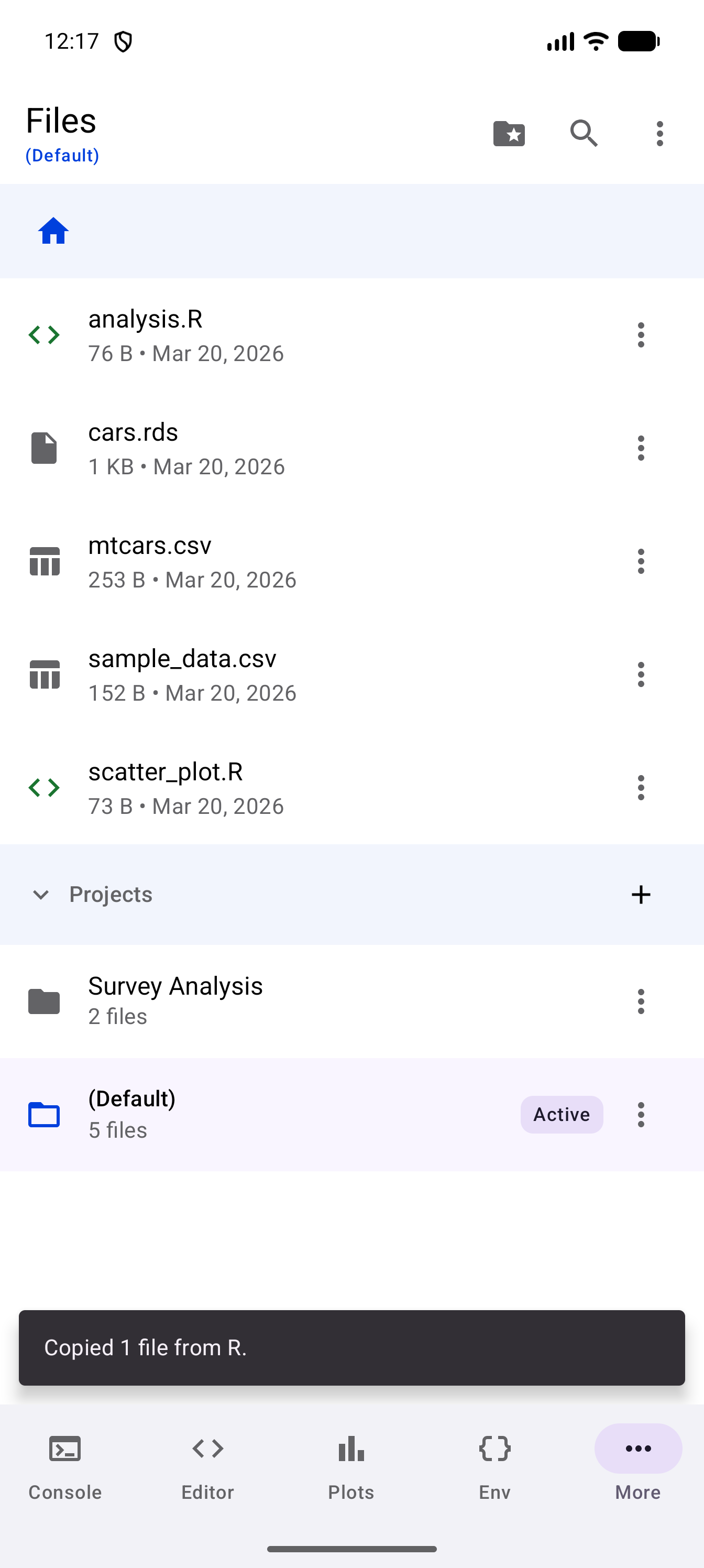 The Files list after Copy Files Back from R, with the new cars.rds among the files and the message “Copied 1 file from R.” at the bottom