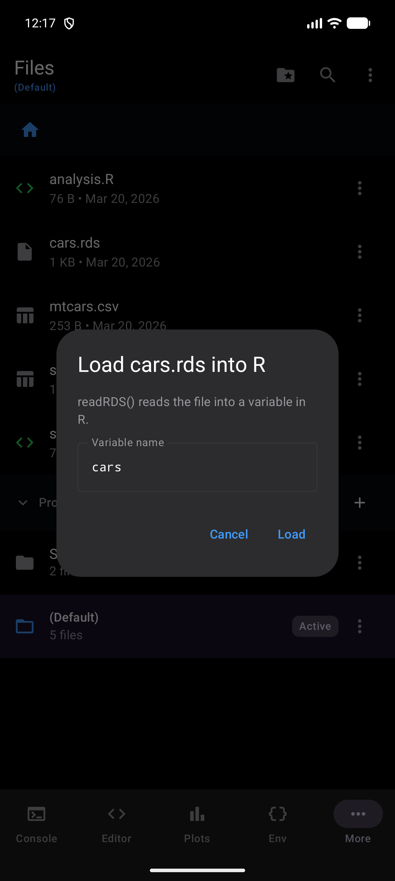 The Load cars.rds into R dialog, explaining that readRDS() reads the file into a variable in R, with the suggested variable name cars and Cancel and Load buttons, in dark mode