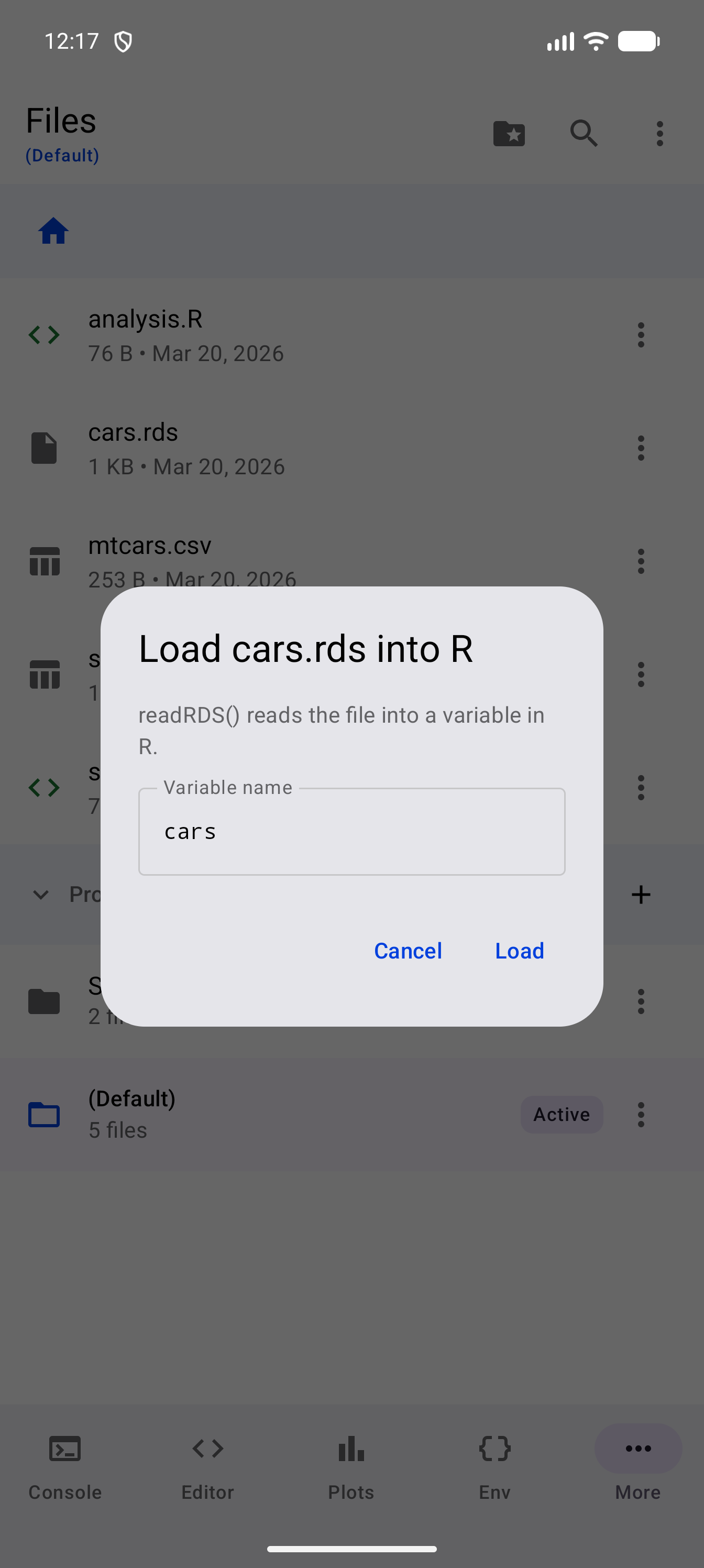 The Load cars.rds into R dialog, explaining that readRDS() reads the file into a variable in R, with the suggested variable name cars and Cancel and Load buttons