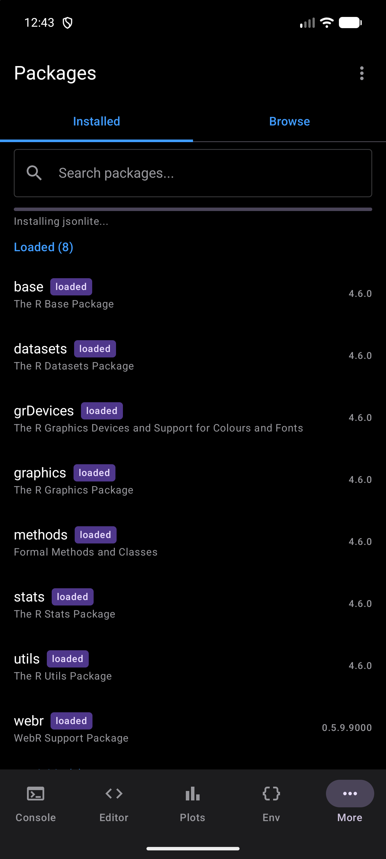 Installed tab with a thin progress bar under the search bar and the message Installing jsonlite…, in dark mode