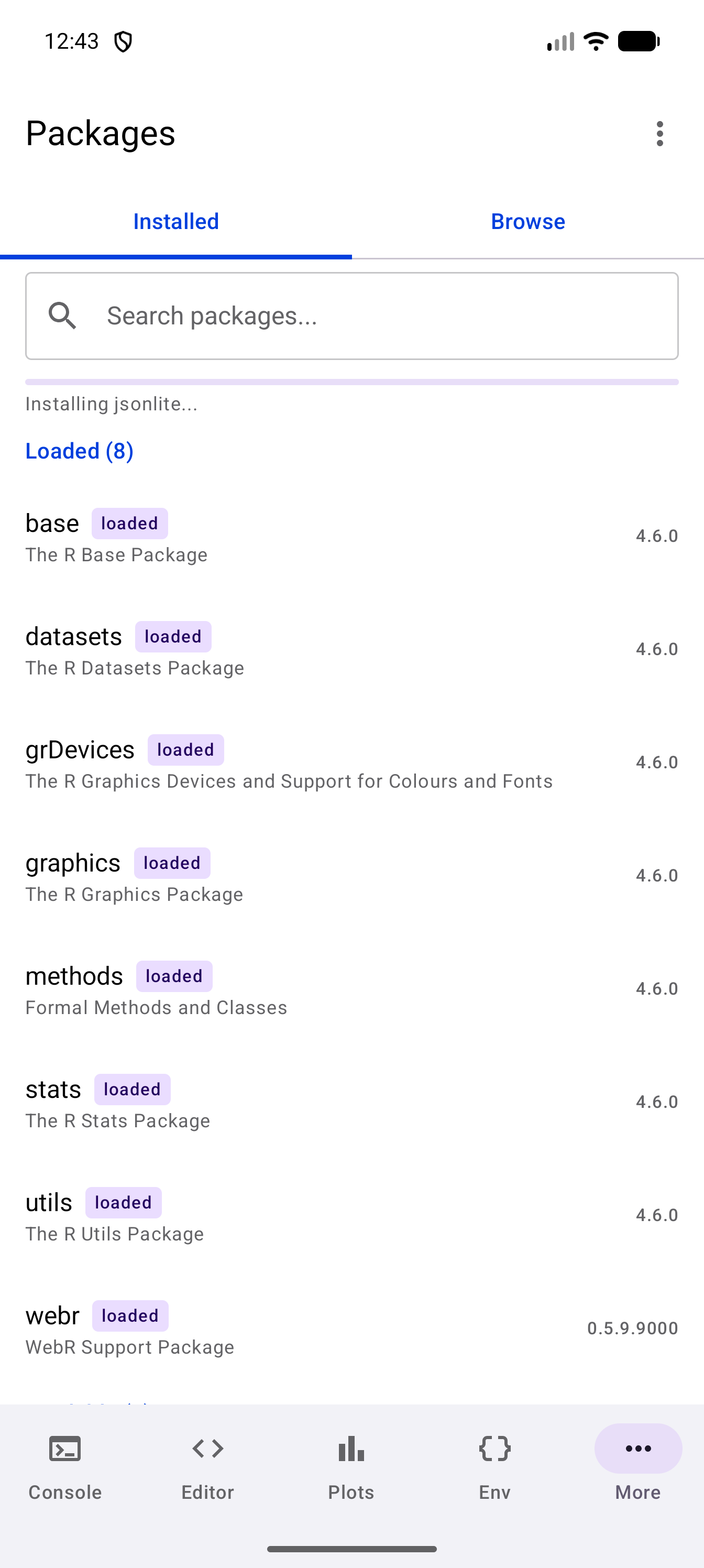 Installed tab with a thin progress bar under the search bar and the message Installing jsonlite…
